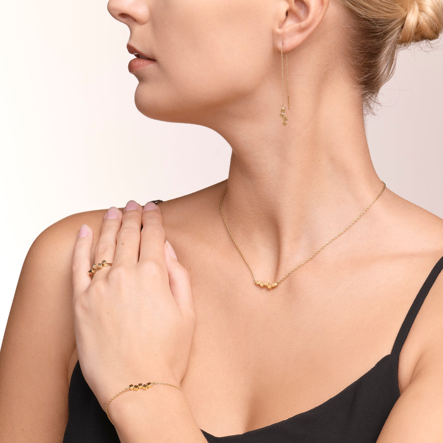 Bracelet Dancing GeoCUBE® small stainless steel gold